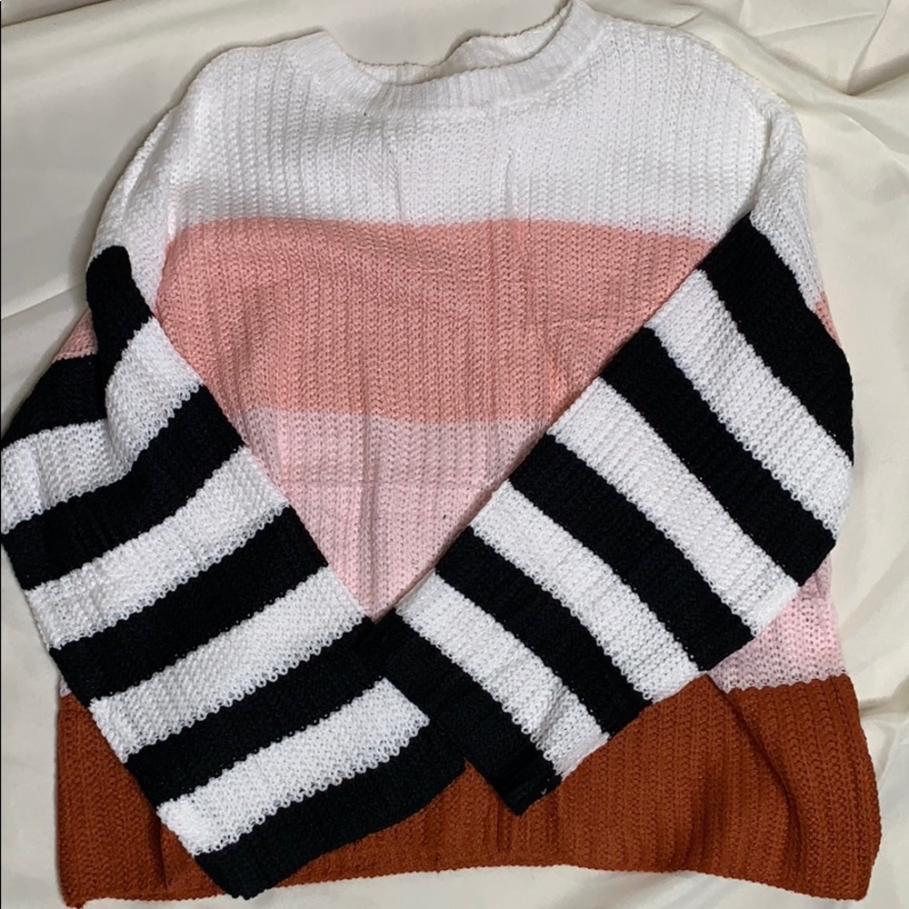 Multi colored, striped sweater.